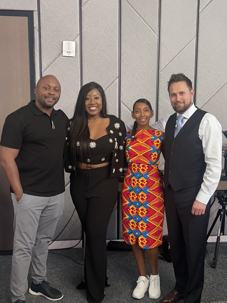 Community members together at a recording session